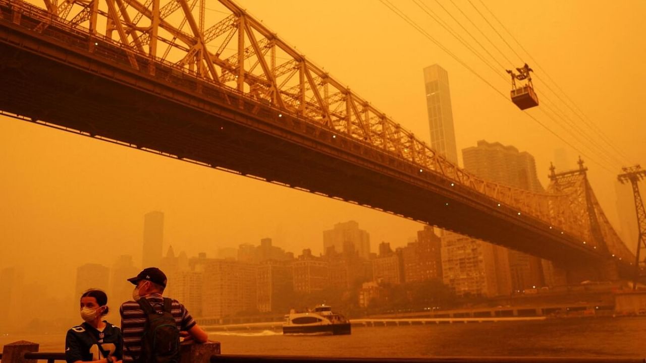 Haze and smoke shroud Manhattan skyline from Canadian wildfires in New York. Credit: Reuters Photo
