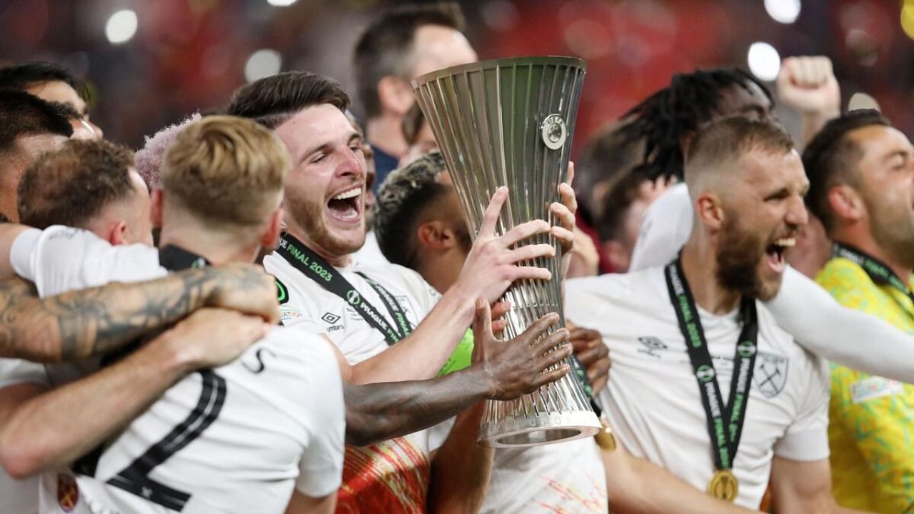 West Ham United's Declan Rice holds the trophy to celebrate after winning the Europa Conference League final. Credit: Reuters Photo