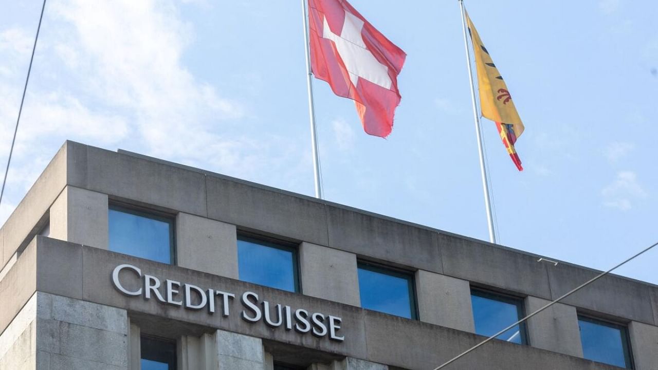 Swiss and Canton de Geneve flags are seen on a building of Swiss bank Credit Suisse in Geneva, Switzerland. Credit: Reuters Photo