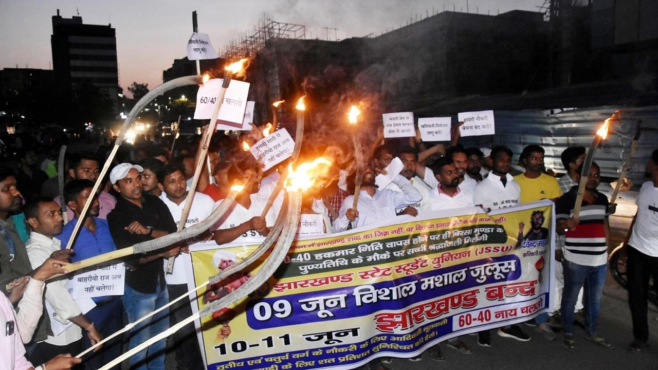 Students take part in torch light procession on the eve of Jharkhand Bandh in Ranchi. Credit: IANS Photo