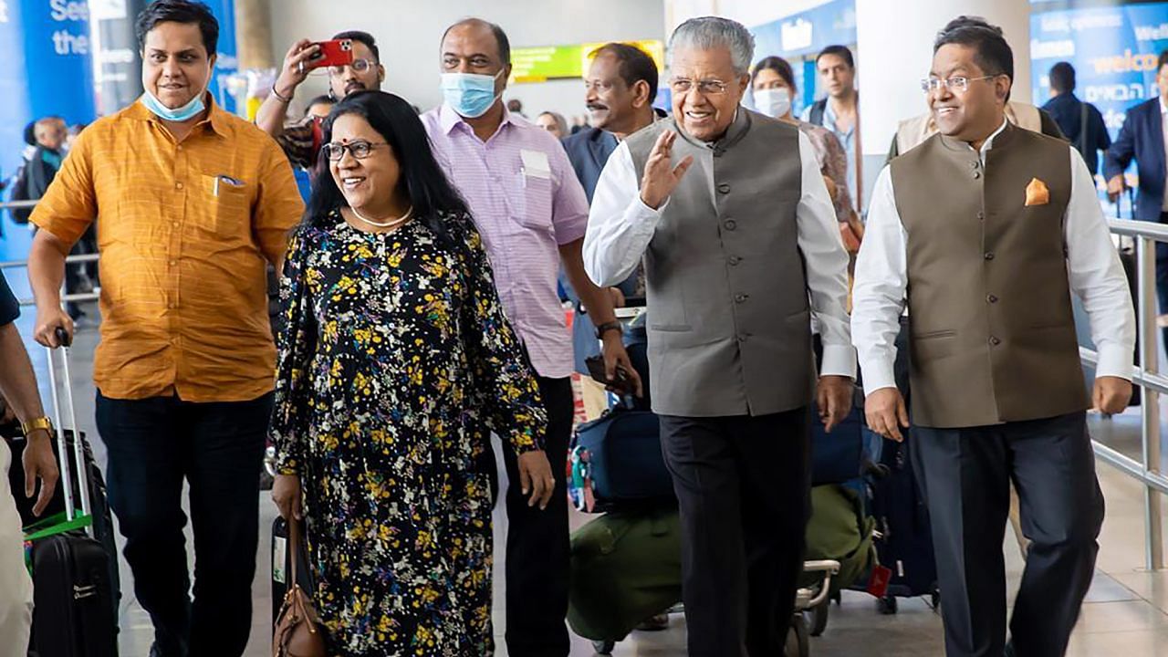 Kerala Chief Minister Pinarayi Vijayan with others during his arrival ahead of Loka Kerala Sabha. Credit: PTI Photo