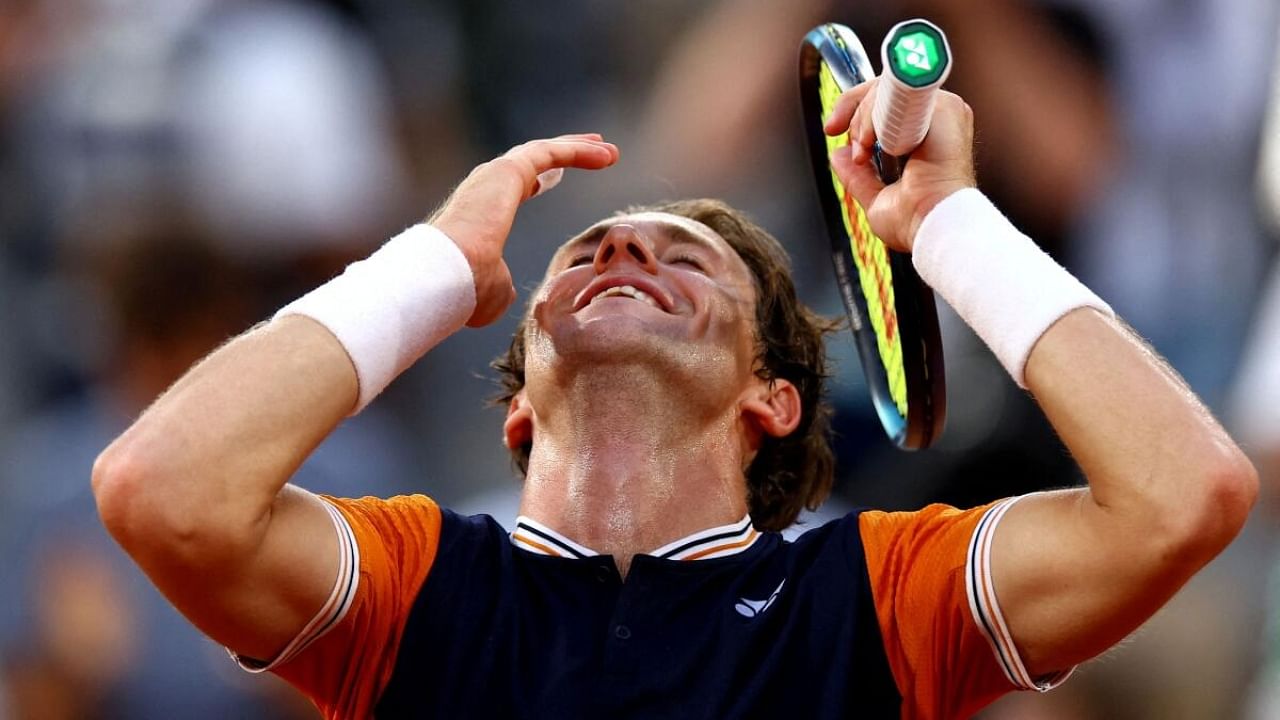 Norway's Casper Ruud celebrates winning his semi final match against Germany's Alexander Zverev. Credit: Reuters Photo