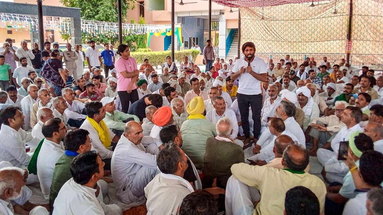 Wrestlers Bajrang punia and Sakshi Malik during a 'mahapanchayat' in Sonipat, Saturday, June 10, 2023. Credit: PTI Photo