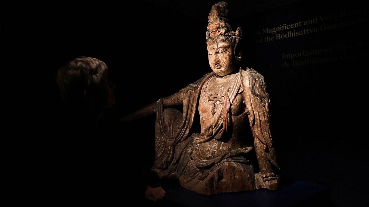 Rare 12th century Buddha statue on auction. Credit: Reuters Photo