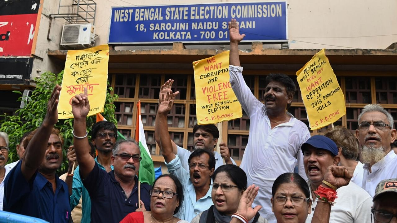 Congress supporters raise slogans during a protest in front of West Bengal State Election Commission office against the alleged killing of their party's worker in Murshidabad ahead of Panchayat polls, in Kolkata, Saturday, June 10, 2023. Credit: PTI Photo