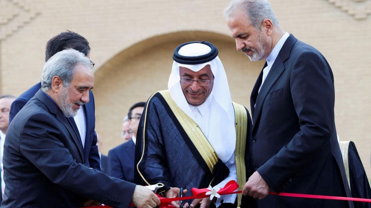 Iran’s Deputy Foreign Minister for Consular Affairs Alireza Bigdeli, Saudi’s Director of Consular Affairs Saudi Ali al-Youssef and Iran’s Charge of consular Hassan Zarnegar at the reopening of Iranian Embassy in Riyadh on June 6. credit: Reuters Photo