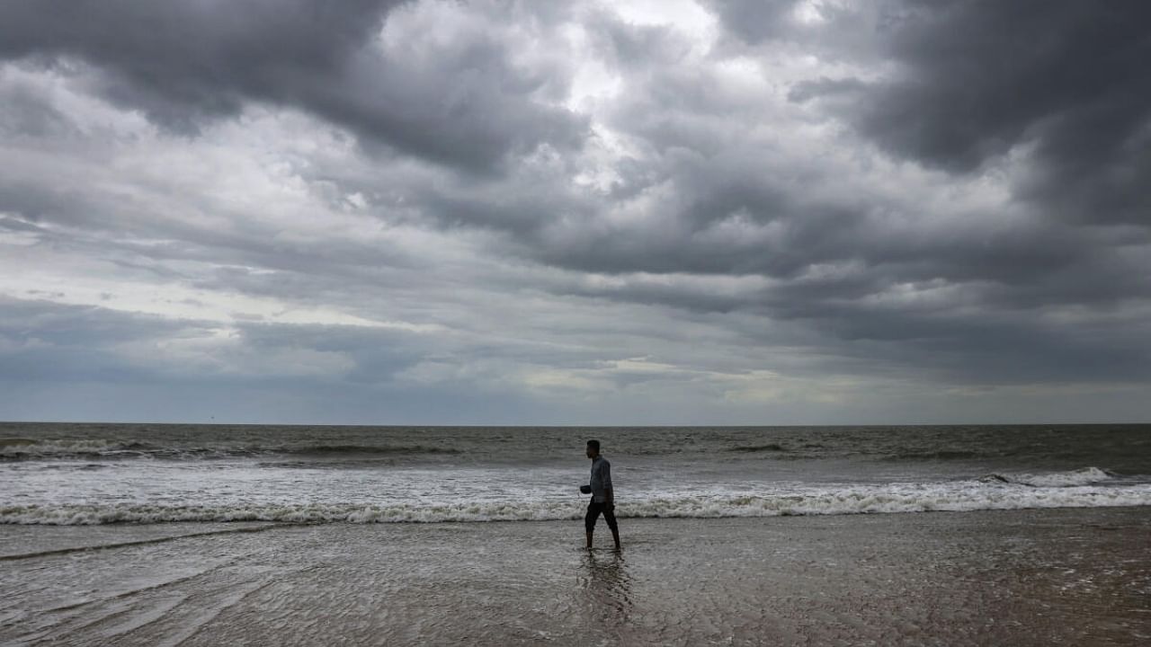  A general view of dense clouds hovering over the Mandvi city ahead of the landfall of Biparjoy cyclone. Credit: PTI Photo