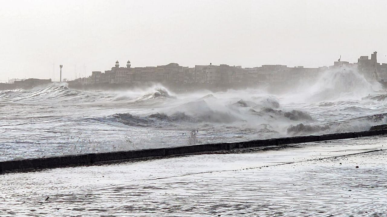 High waves crash against the beachline ahead of Cyclone Biporjoy's expected landfall, in Porbandar. Credit: PTI Photo