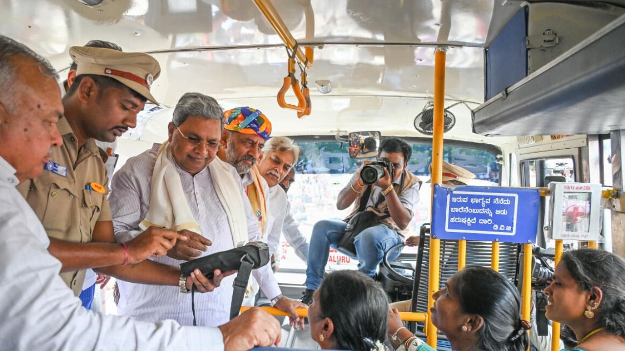 Karnataka CM Siddaramaiah, deputy CM DK Shivakumar issue free bus tickets to women after inaugurating Shakti scheme. Credit: DH Photo