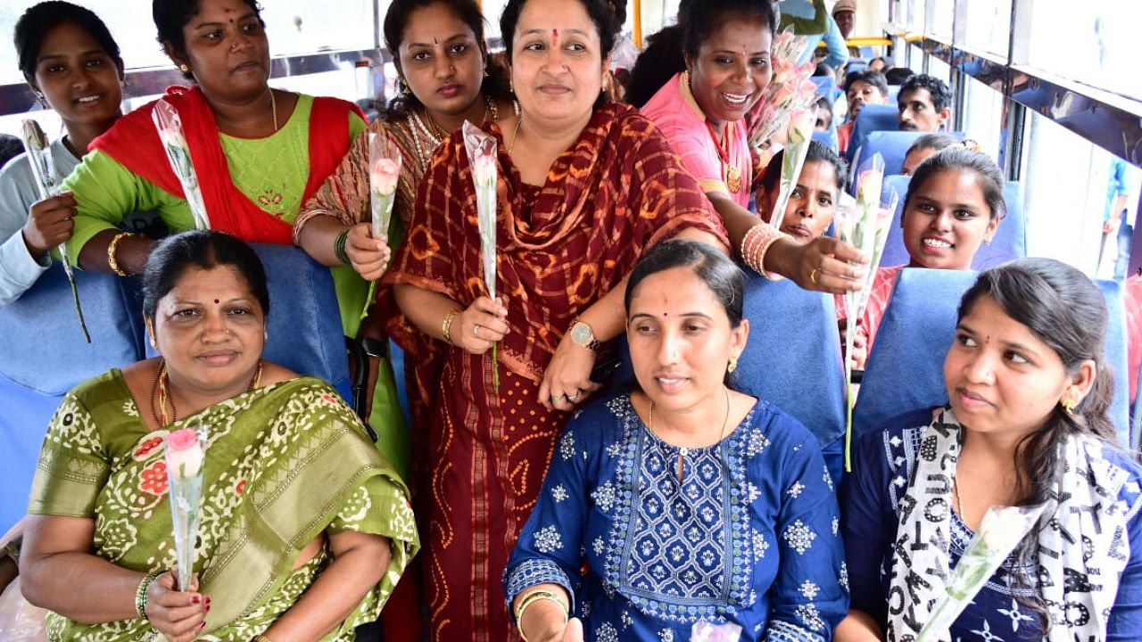 Women travel by the 'Shakti' bus from the Kempegowda Bus Terminal in Bengaluru on Sunday. DH Photo/Kishor Kumar Bolar