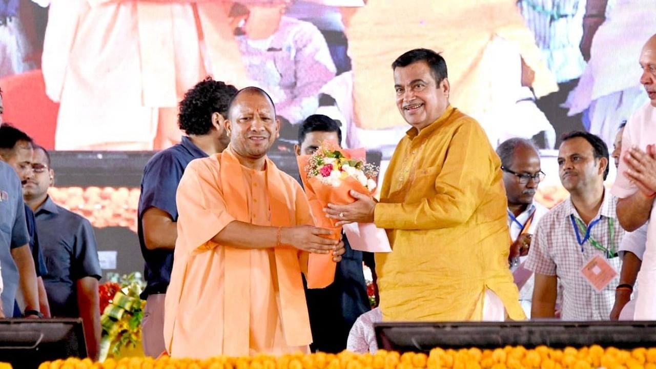 Uttar Pradesh Chief Minister Yogi Adityanath (L) and Union Minister Nitin Gadkari (R). Credit: IANS Photo