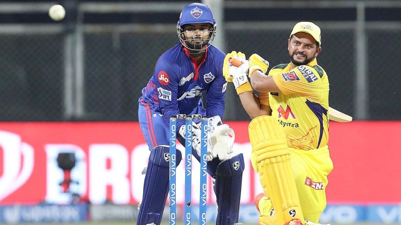 Suresh Raina (right) playing in the IPL. Credit: PTI File Photo