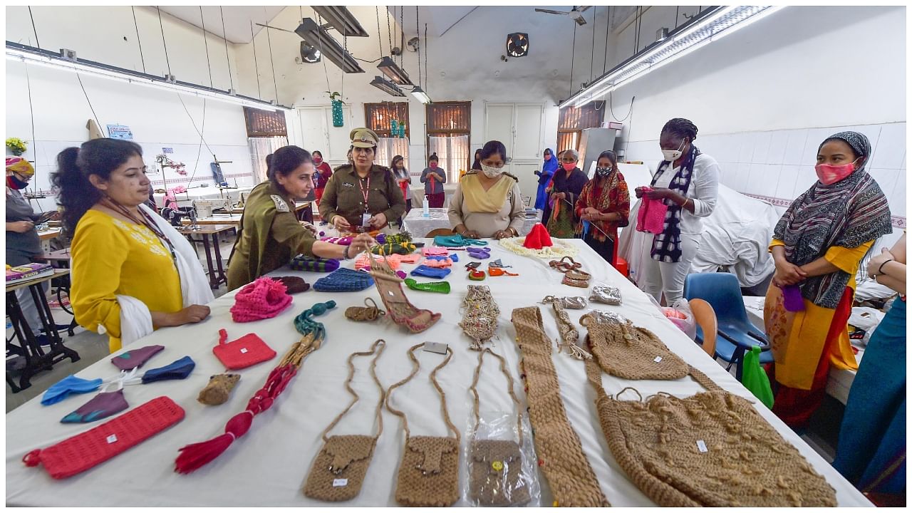 In this file photo, police have a look at the jute bags made by the women inmates, at the Central Jail No. 6 of Tihar, in New Delhi. Credit: PTI Photo