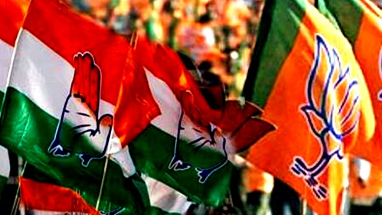 Flags of the Congress and the BJP. Credit: IANS Photo