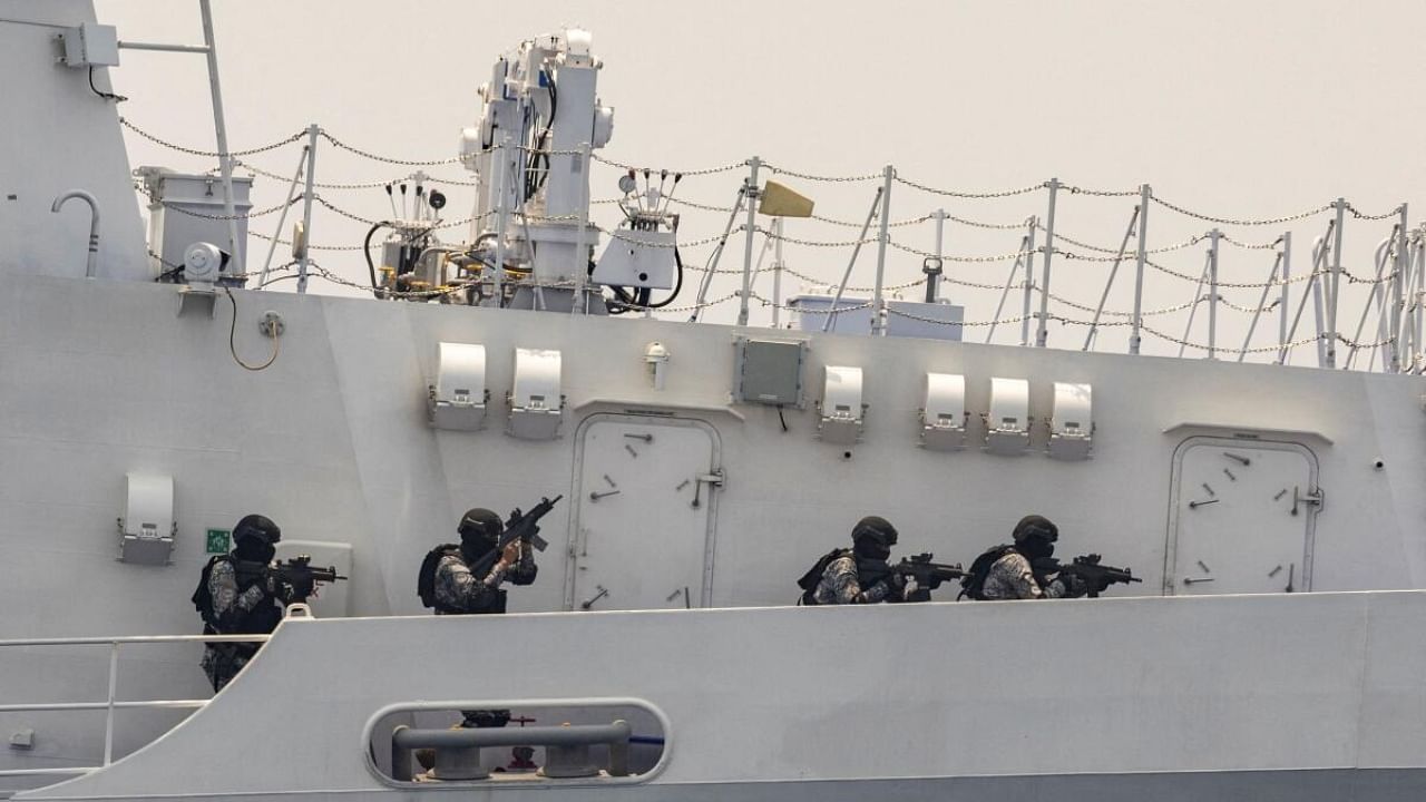Members of the Philippine Coast Guard on board of BRP Melchora Aquino participate in a simulation exercise during the first trilateral coast guard exercise between the Philippines, Japan, and the US in the South China Sea, June 6, 2023. Credit: Reuters Photo