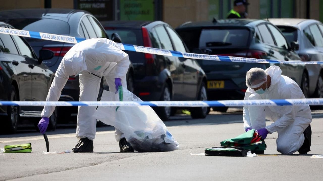 Police officers work following the deadly attack in Nottingham. Credit: Reuters Photo