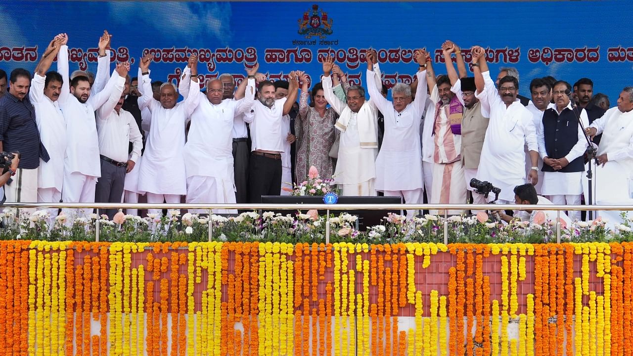 Newly-elected Karnataka Chief Minister Siddarmaiah, deputy CM DK Shivakumar, AICC President Mallikarjun Kharge, Congress leaders Rahul Gandhi, Priyanka Gandhi, Tamil Nadu CM M K Stalin, Bihar CM Nitish Kumar, Jharkhand CM Hemant Soren, Himachal Pradesh CM Sukhvinder Sukhu and others during the oath ceremony of Karnataka government, at Kanteerava Stadium in Bengaluru, Saturday, May 20, 2023. Credit: PTI File Photo