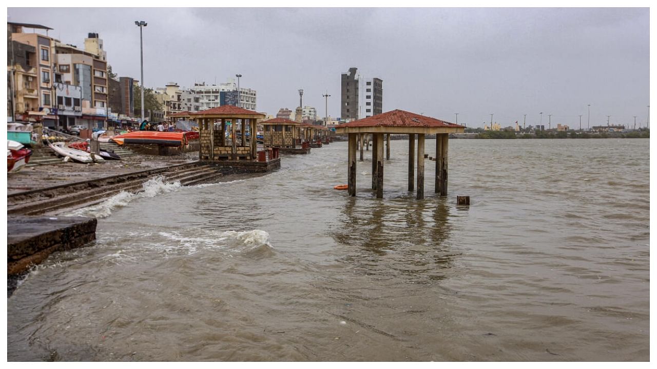 A deserted ghat near Dwarkadhish temple ahead of the landfall of Cyclone Biparjoy, in Dwarka, Thursday, June 15, 2023. Credit: PTI Photo