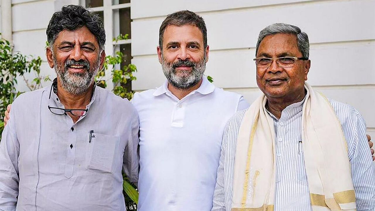 DKS (L), Rahul Gandhi (C), and Siddaramaiah (R). Credit: PTI File Photo