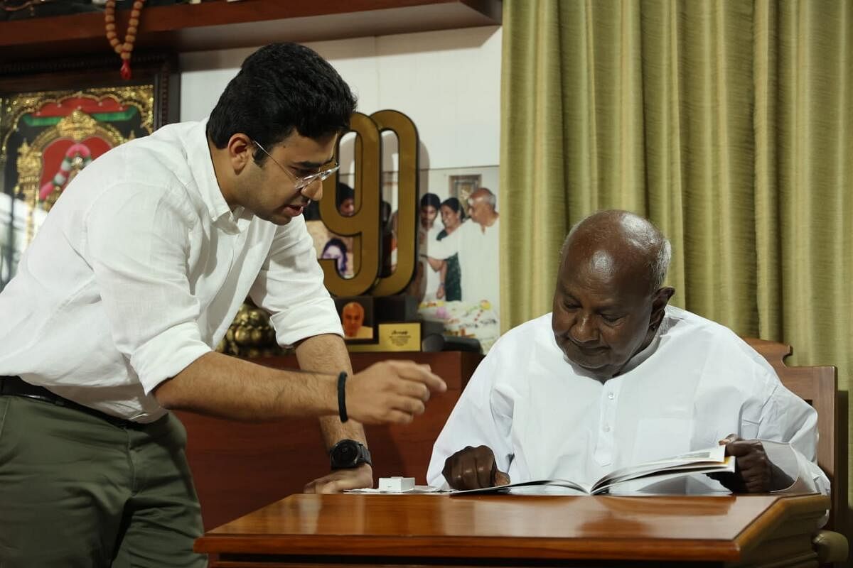 Bangalore South MP Tejasvi Surya meets former Prime Minister H D Deve Gowda at latter's residence in Padmanabhanagar in Bengaluru on Wednesday.