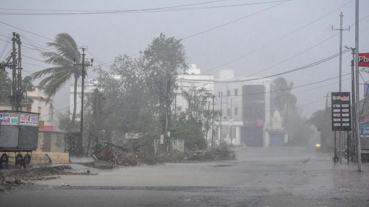 A view of heavy rainfall with strong winds as cyclone Biparjoy starts making landfall at Mandvi, in Kutch, Thursday, June 15, 2023. Credit: PTI Photo