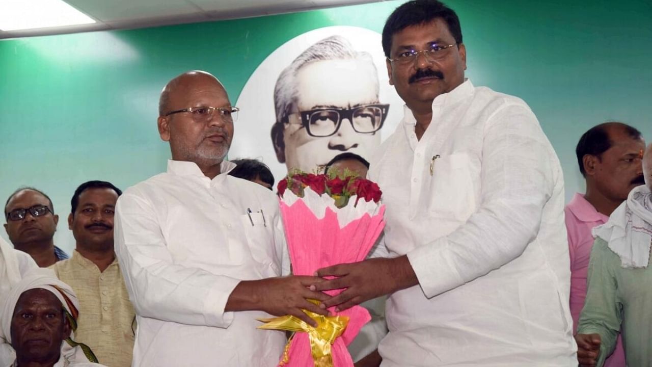 Janata Dal (United) state president Umesh Singh Kushwaha present bouquet to newly sworn-in Bihar Minister and Janata Dal (United) MLA Ratnesh Sada during a felicitation function, at Party office, in Patna on Friday June 16, 2023. Credit: IANS Photo