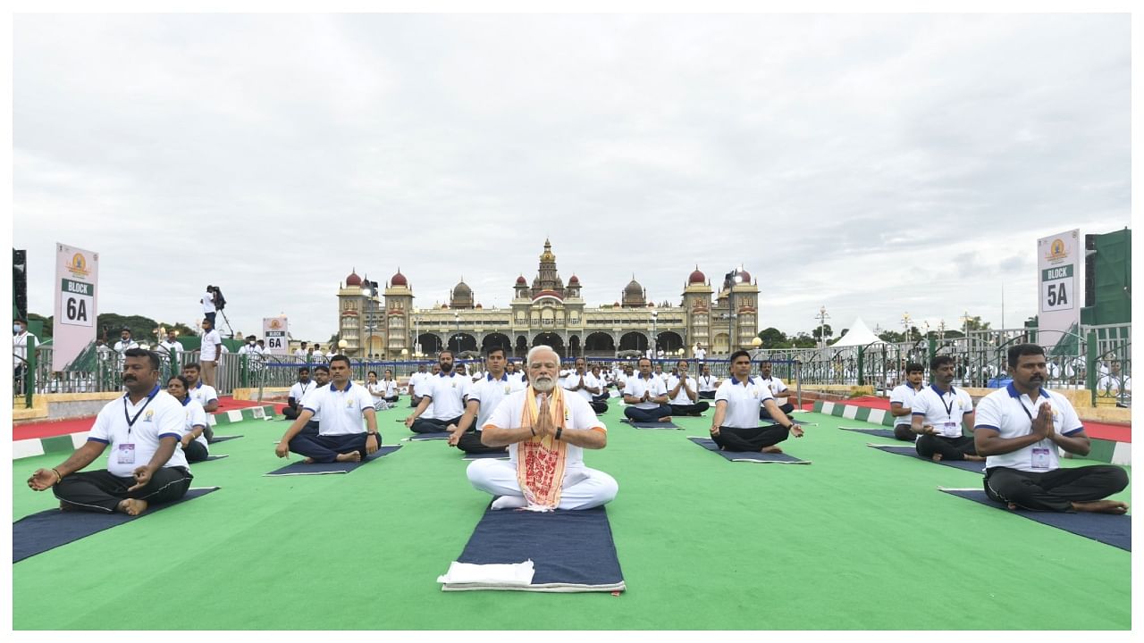 PM Modi participating in the International Yoga Day held in Mysuru, in 2022. Credit: Twitter/@narendramodi