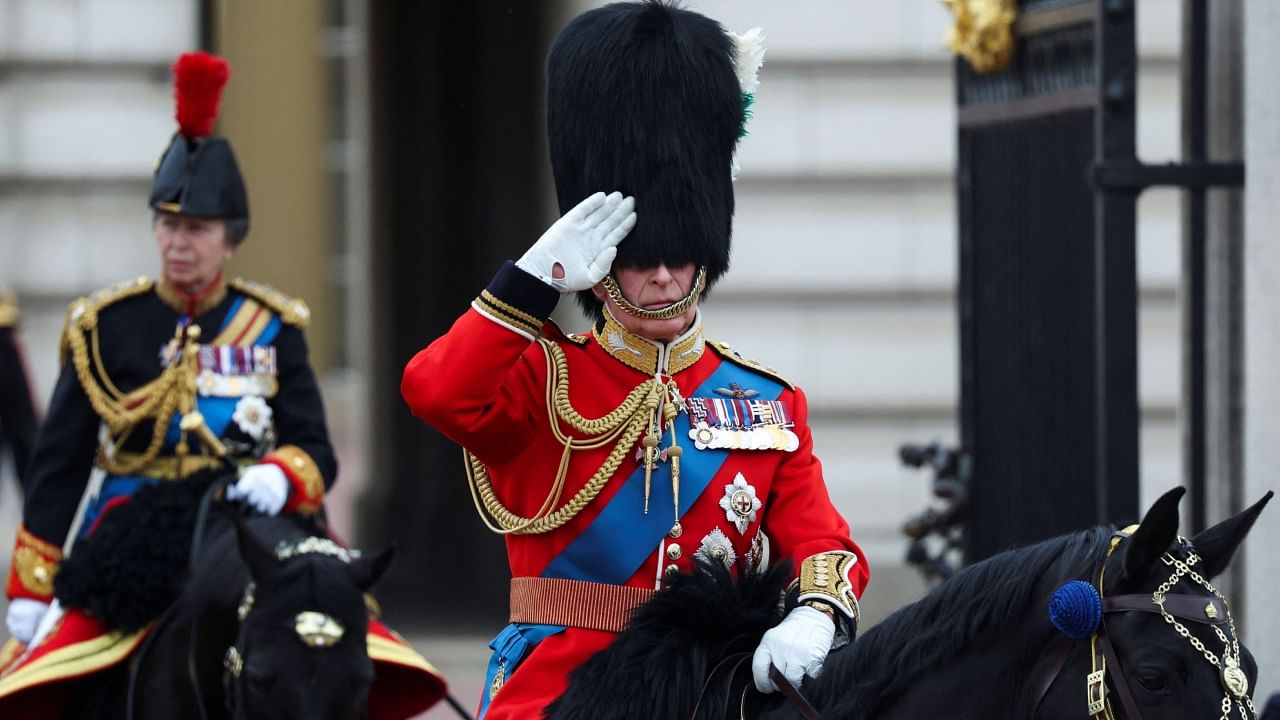 Britain's King Charles salutes as he rides on horseback as part of Trooping the Colour parade which honours him on his official birthday, in London, Britain, June 17, 2023. Credit: Reuters Photo