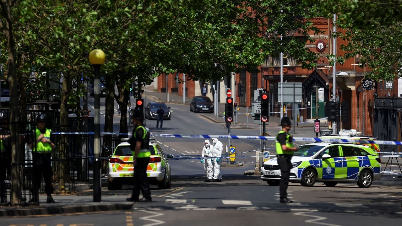 Police forensics officers work at a site cordoned with police tape, following the incident in Nottingham city centre, Nottingham, Britain, June 13, 2023. Credit: Reuters Photo