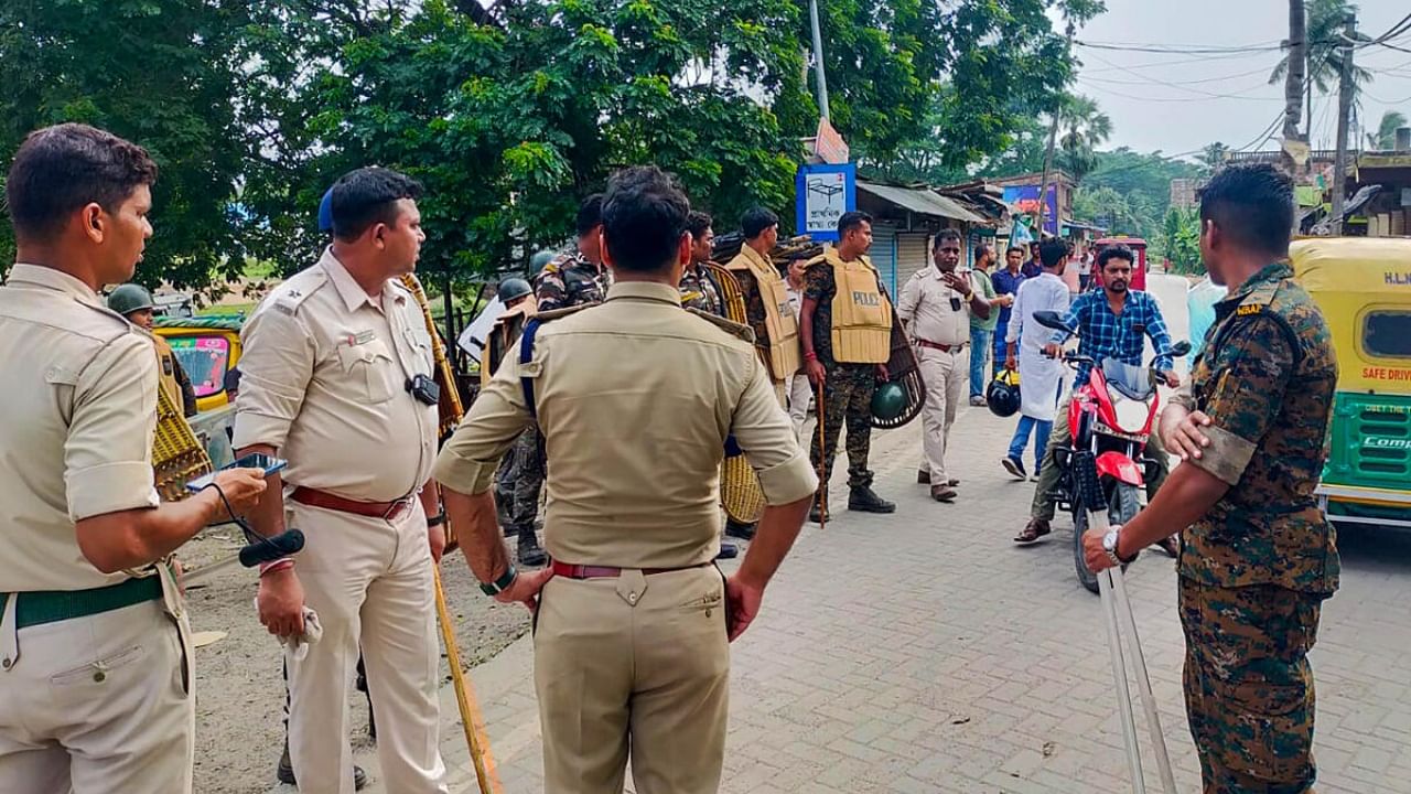 Police personnel stand guard at violence-hit areas ahead of the panchayat elections, in South 24 Parganas, Saturday, June 17, 2023. Credit: PTI Photo