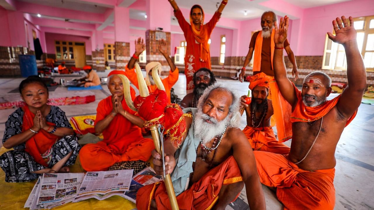  Sadhus wait to register themselves for the Amarnath Yatra, at Ram Mandir base camp in Jammu. Credit: PTI Photo