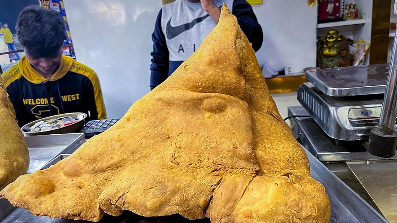 A huge samosa named 'Bahubali Samosa' being sold at a shop in Meerut. Credit: PTI Photo