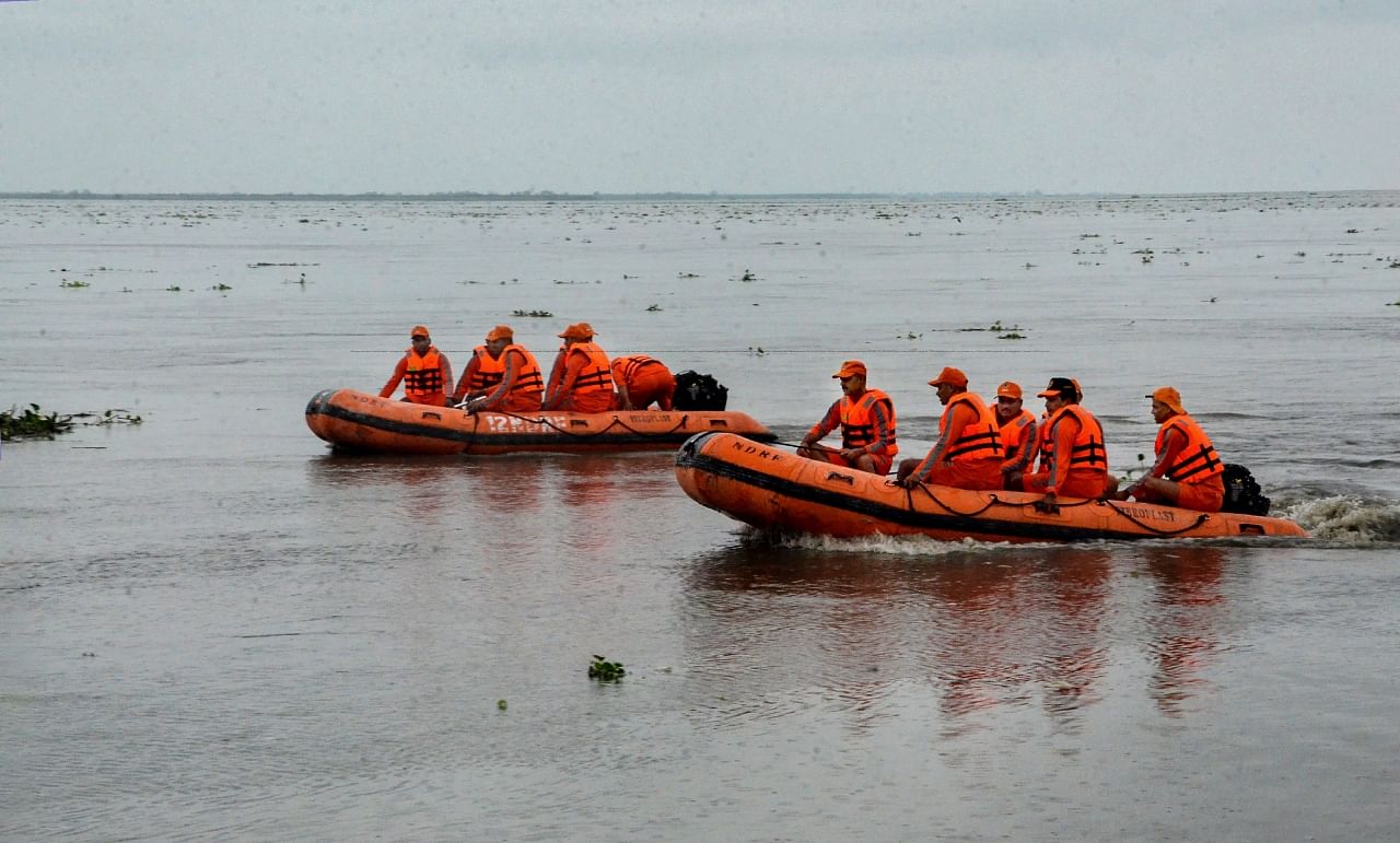 National Disaster Response Force (NDRF) personnel prepare and exercise for the upcoming flood season, on the banks of river Brahmaputra amidst rising water levels due to frequent rainfall, at Tezpur Jahaj Ghat, in Sonitpur district, Wednesday, June 14, 2023. Credit: PTI Photo