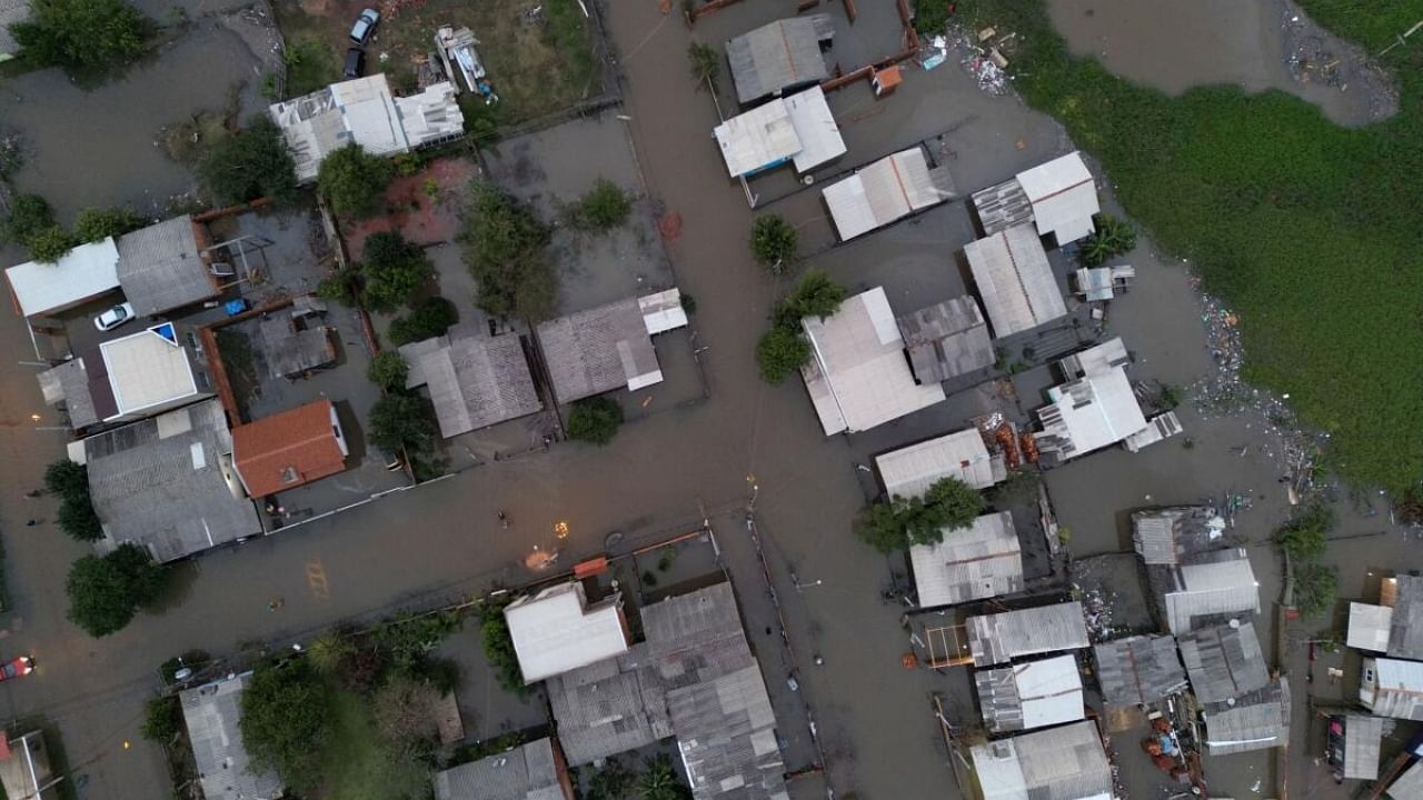 An aerial view shows damage and floods due to heavy rains after an extra-tropical cyclone, in Sao Leopoldo, Rio Grande do Sul state, Brazil June 17, 2023. Credit: Reuters Photo