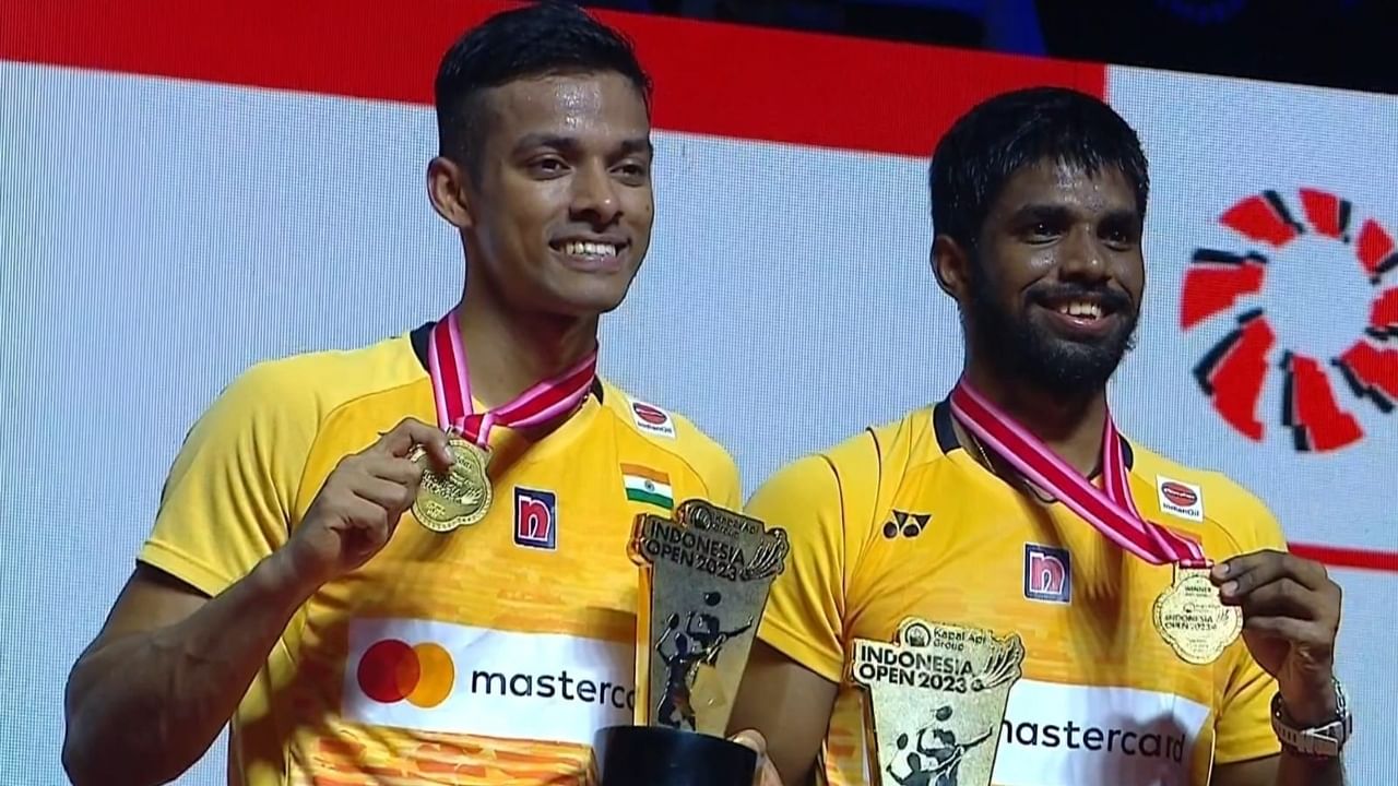 The Indian duo of Satwiksairaj Rankireddy and Chirag Shetty celebrate their historic men's doubles title win at the Indonesia Open, June 18, 2023. Credit: IANS Photo