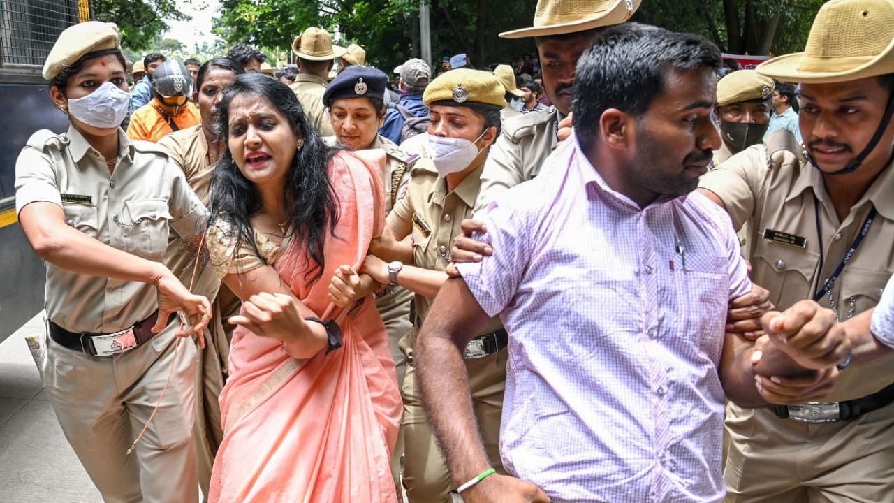 In Bengaluru, police arrest a KPSC candidate participating in a protest that urged the prompt release of results of the exam conducted two years ago. Credit: DH Photo/ MS Manjunath