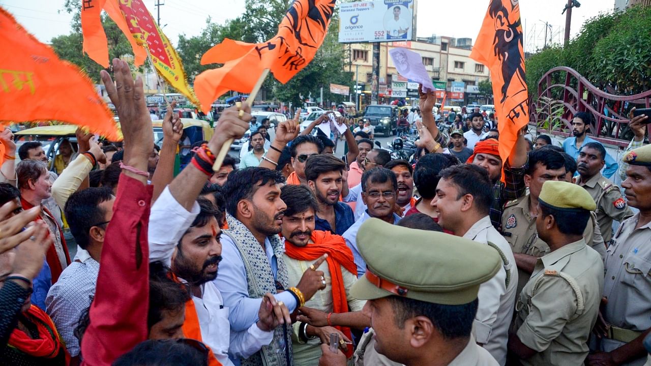 Activists of a Hindu organization in Sigra protest against the movie ‘Adipurush’ at a mall, in Varanasi, Sunday, June 18, 2023. Credit: PTI Photo