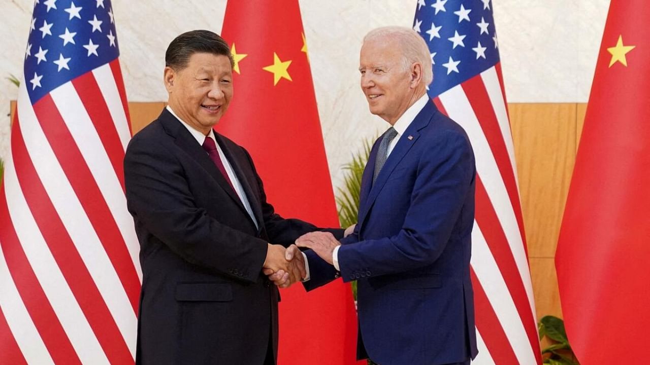 US President Joe Biden shakes hands with Chinese President Xi Jinping. Credit: Reuters Photo