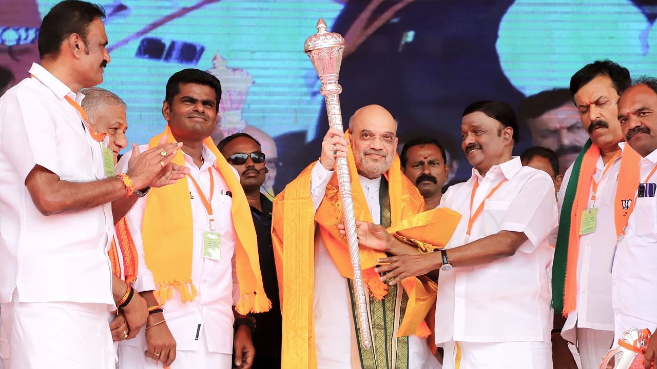 Union Home Minister Amit Shah being felicitated by party leaders during a public meeting, in Vellore. Credit: PTI Photo