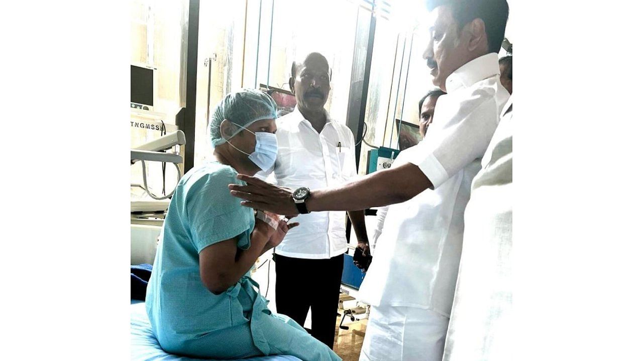 Tamil Nadu CM MK Stalin meets V Senthil Balaji, who has been admitted to the hospital after he fell ill during an ED raid at his place. Credit: IANS Photo