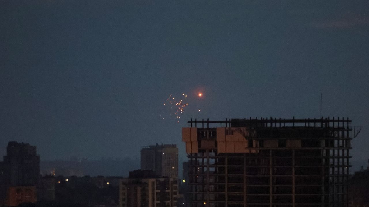 An explosion of a drone is seen in the sky over the city during a Russian drone strike, amid Russia's attack on Ukraine, in Kyiv, Ukraine. Credit: Reuters Photo