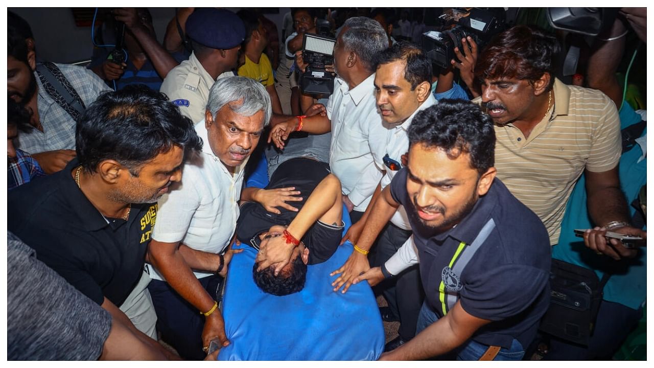 Tamil Nadu Electricity Minister V Senthil Balaji reacts in pain while being taken to a government hospital after his arrest in connection with a money laundering case, in Chennai, Tuesday night, June 13, 2023. Credit: PTI Photo