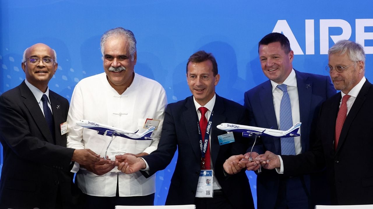 Venkataraman Sumantran, Chairman of IndiGo, Rahul Bhatia, Managing Director of IndiGo, Guillaume Faury, CEO of Airbus, Pieter Elbers, CEO of IndiGo and Christian Scherer, Chief Commercial Officer of Airbus, attend a news conference after a purchase agreement between IndiGo and Airbus for 500 A320 Family aircraft, at the 54th International Paris Airshow at Le Bourget Airport near Paris, France, June 19, 2023. Credit: Reuters Photo