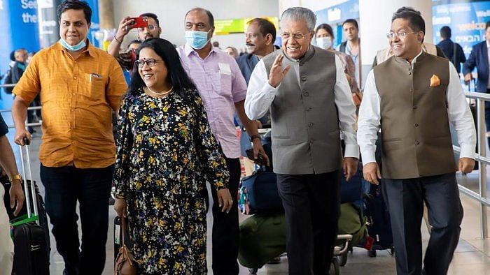 Kerala Chief Minister Pinarayi Vijayan with others during his arrival ahead of Loka Kerala Sabha, in New York, Friday, June 9, 2023. Credit: PTI Photo
