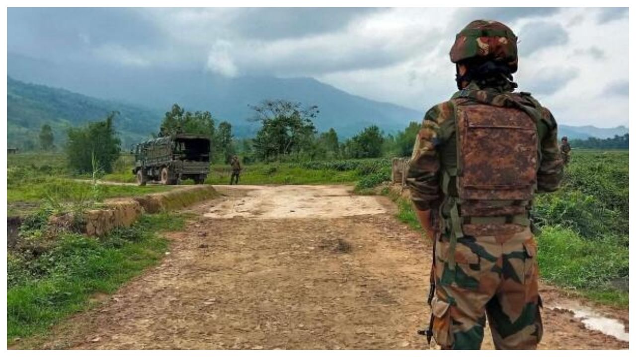Security officials patrol in the violence-hit area at Irengbam village of Bishnupur district in Manipur on June 19 ,2023. Credit: IANS Photo