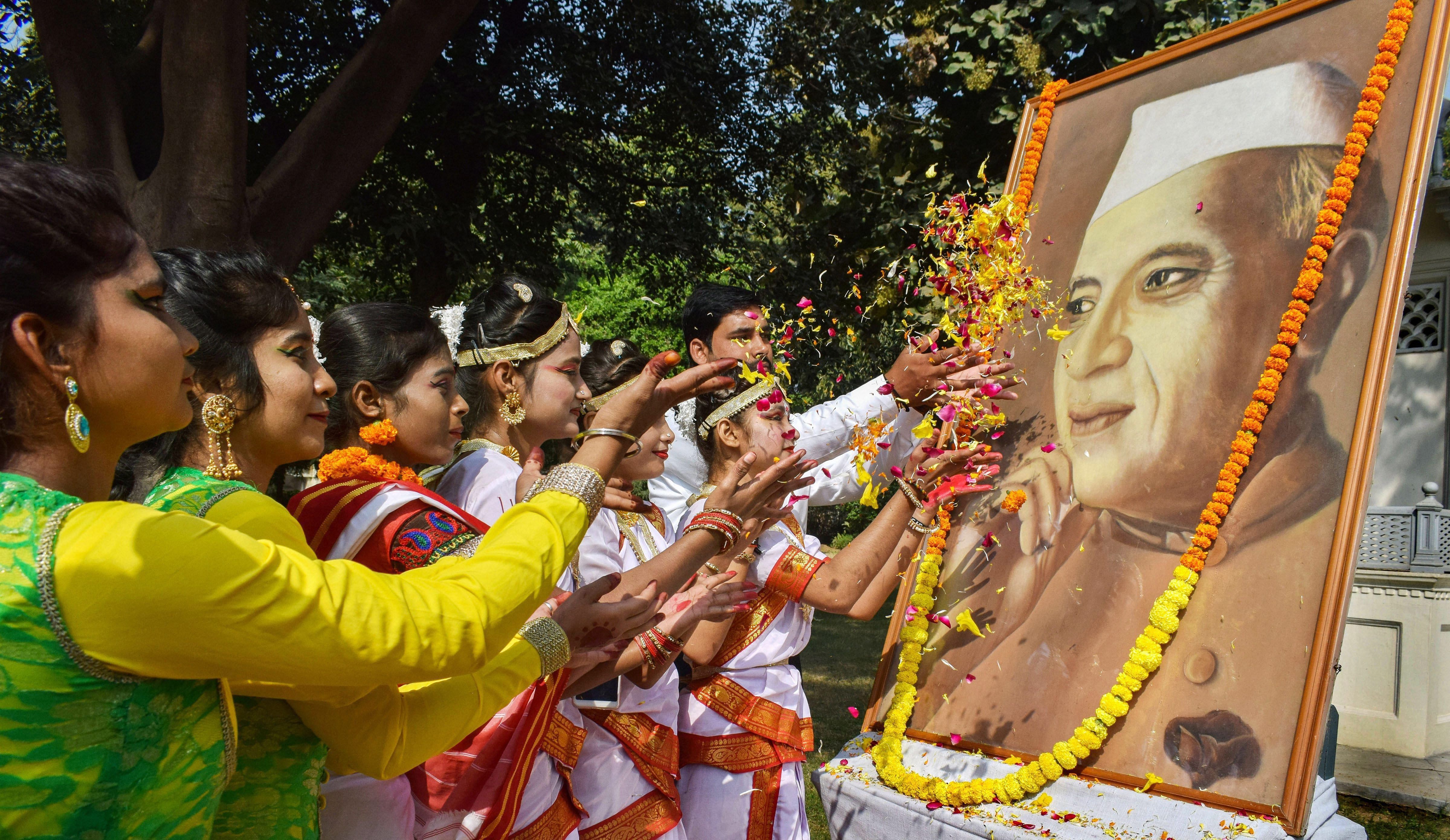 Students pay floral tribute to Pt. Jawaharlal Nehru. Credit: PTI File Photo