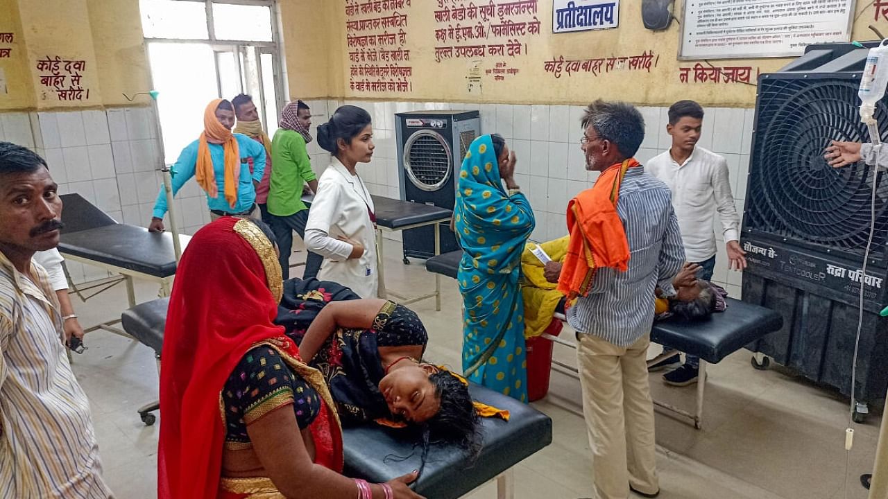 View of a ward where a jumbo cooler has been installed for the heat stroke patients admitted at a hospital during extreme weather conditions, in Ballia. Credit: PTI Photo