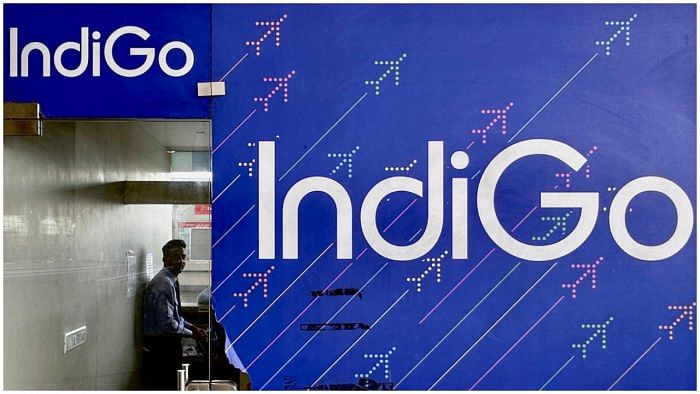 A person is seen inside an IndiGo airlines ticketing office at Chhatrapati Shivaji International airport in Mumbai. Credit: Reuters Photo