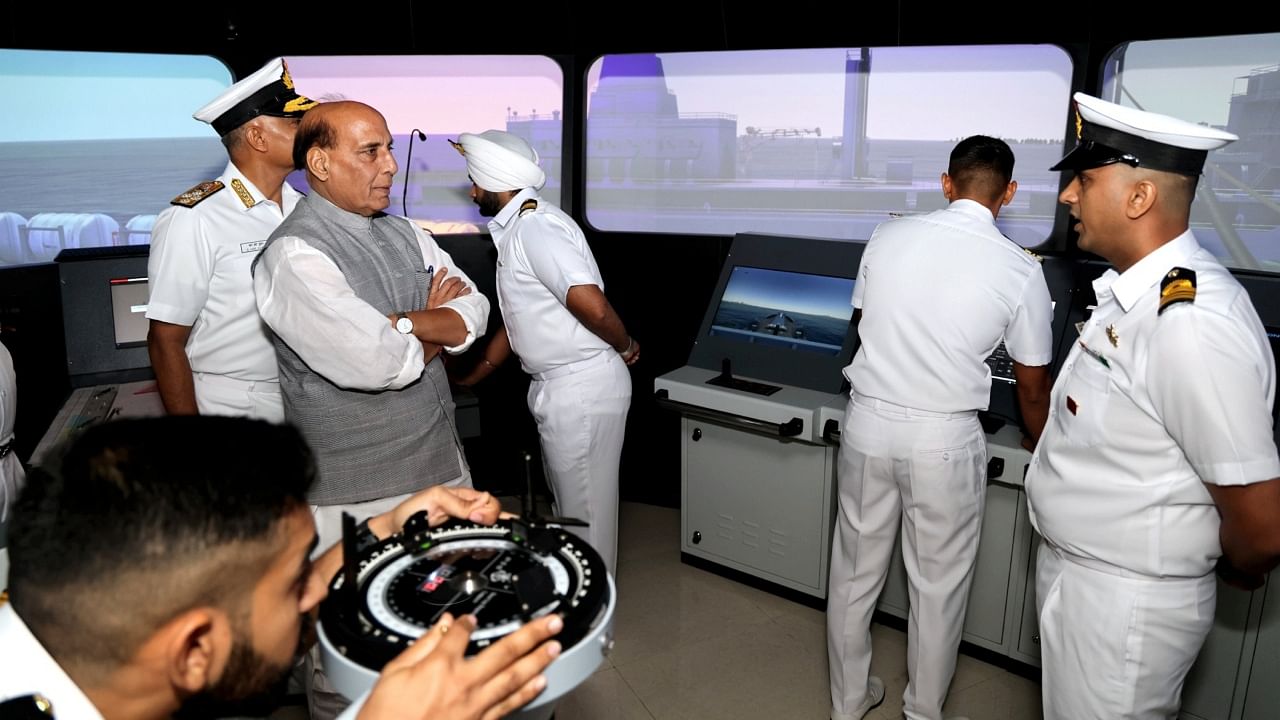 Union Defence Minister Rajnath Singh visits the Integrated Simulator Complex ‘Dhruv’ at Southern Naval Command. Credit: PTI Photo