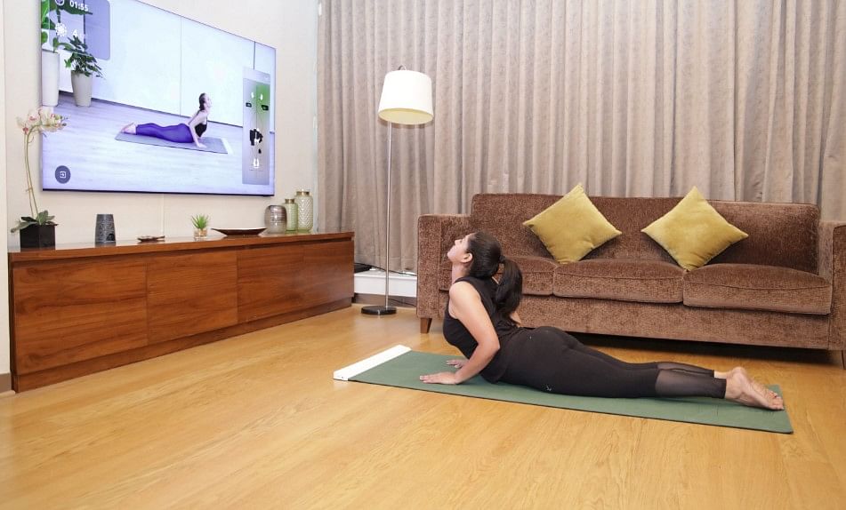 With YogiFi app, Samsung smart TV owners can subscribe to interactive virtual yoga sessions. Credit: Samsung India